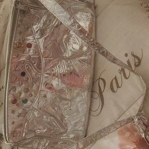 Shiny silver metallic gemstone bag